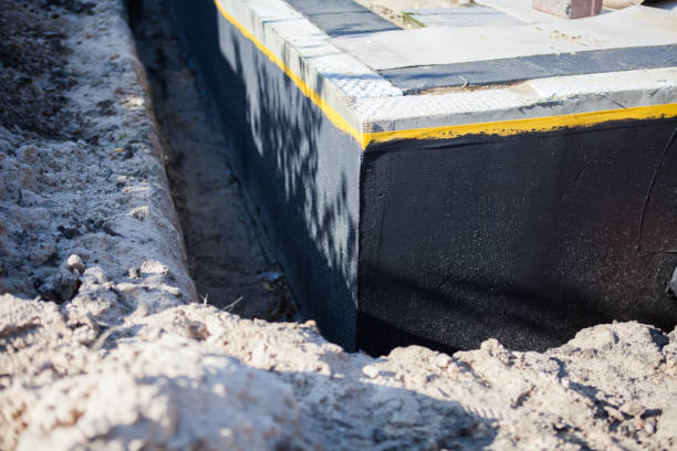 Professional Interior Drainage System technician working in Uniondale, NY